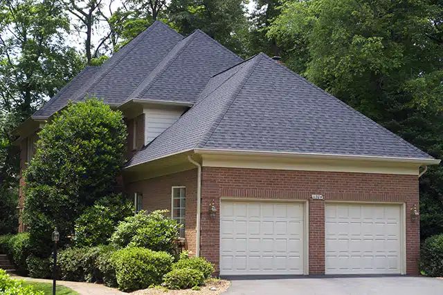 Brick home with new hip roof
